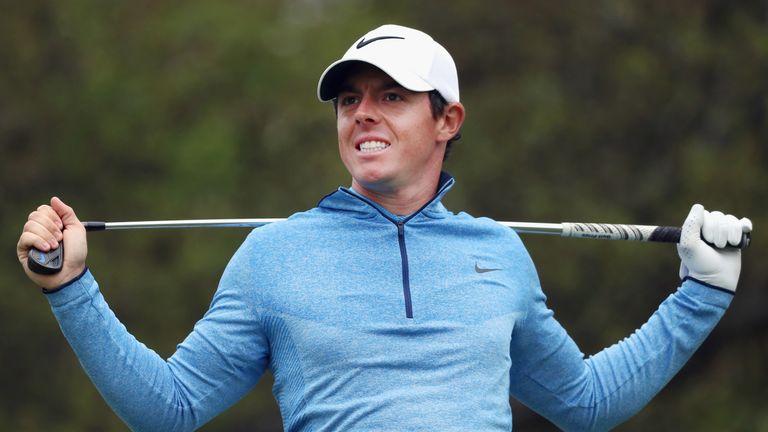 AUSTIN, TX - MARCH 27:  Rory McIlroy of Northern Ireland reacts to his tee shot on the tenth hole during his semifinal match with Jason Day at the World Go