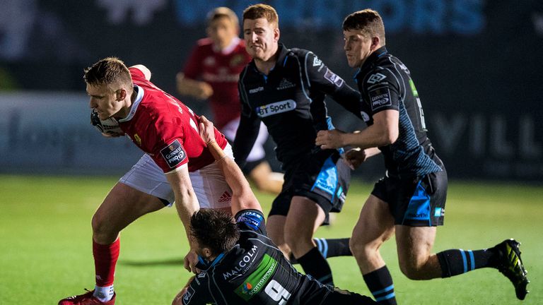 Glasgow Warriors vs Munster.Munster's Rory Scannell tackled by Ali Price of the Warriors.Mandatory Credit ..INPHO/Craig Watson