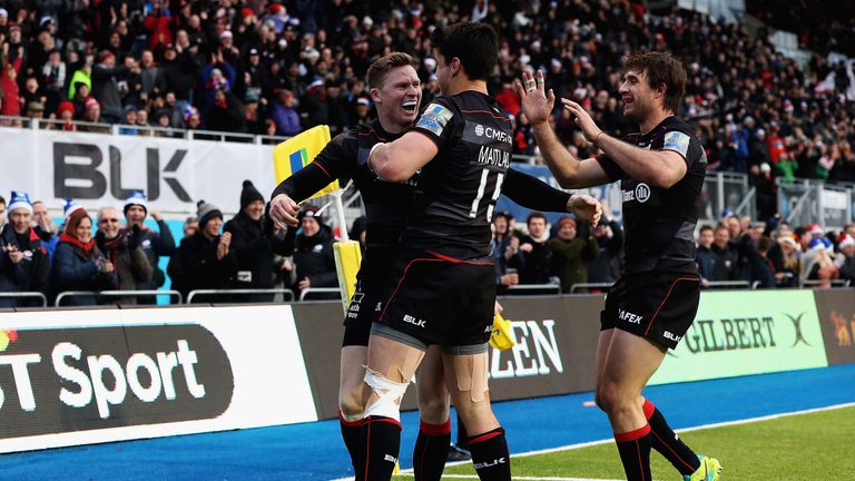 Chris Ashton is congratulated after scoring against Newcastle