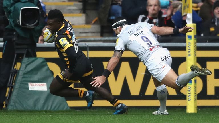 Christian Wade crosses for his first of three tries against Bath