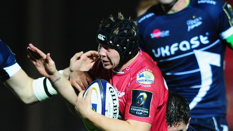 James Davies is tackled by Cameron Neild of Sale Sharks