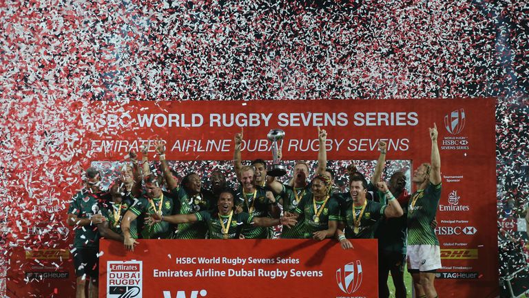 DUBAI, UNITED ARAB EMIRATES - DECEMBER 03:  Players of South Africa celebrate beating Fiji to win the Cup Final during day three of the Emirates Dubai Rugb