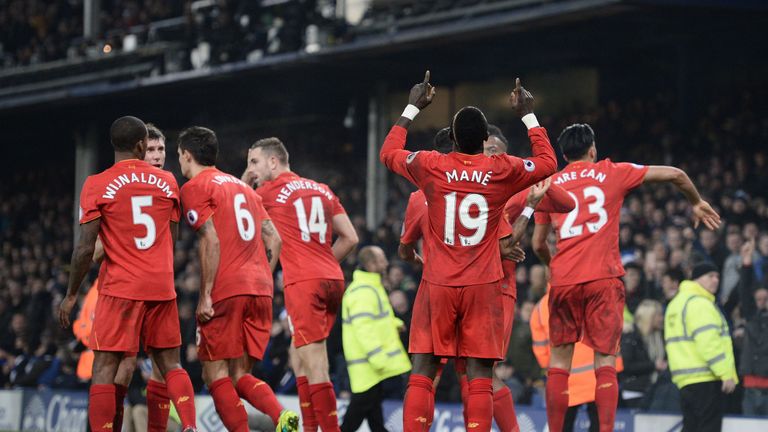 Liverpool's Senegalese midfielder Sadio Mane celebrates scoring his team's first goal 