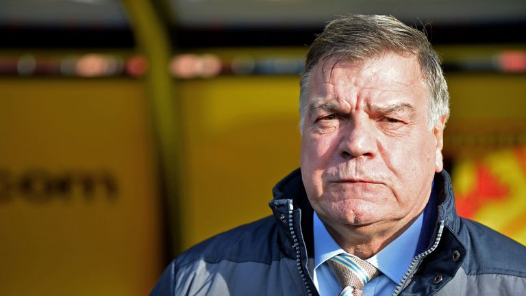 Sam Allardyce stands in the dugout at Vicarage Road prior to kick off