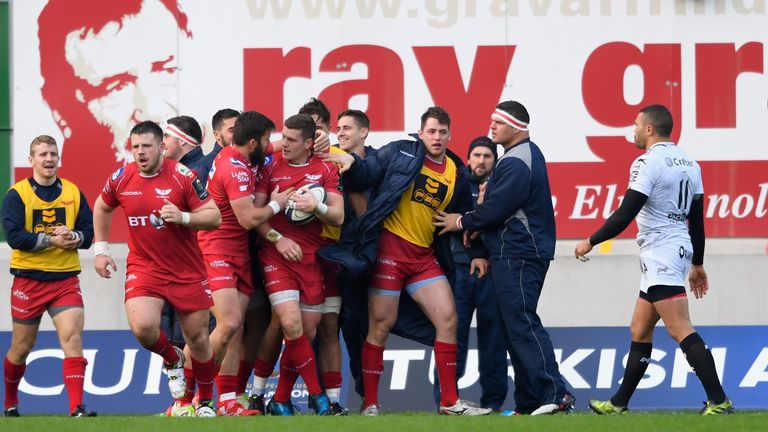 DECEMBER 18 2016: Scarlets centre Scott Williams (c) celebrates his opening try with team mates during the champions Cup match  AGAINST TOULON