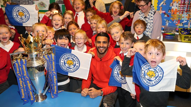 Riyad Mahrez surprises young fans with a surprise visit with the Premier League Trophy