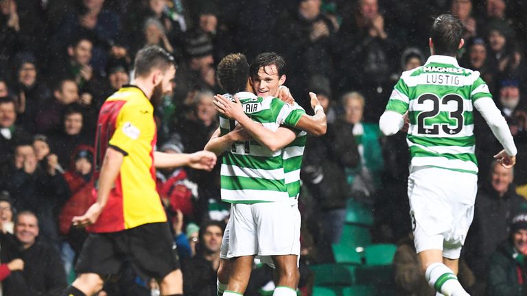 Liam Henderson and Scott Sinclair celebrate Celtic's winning goal against Partick