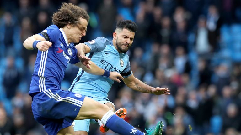 Manchester City's Sergio Aguero (top) fouls Chelsea's David Luiz (right) before being sent-off during the Premier League match at the Etihad Stadium
