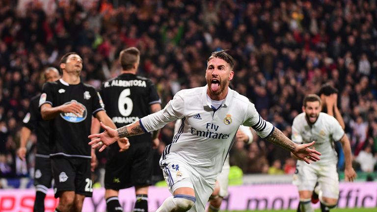 Real Madrid's defender Sergio Ramos celebrates after scoring against Deportivo