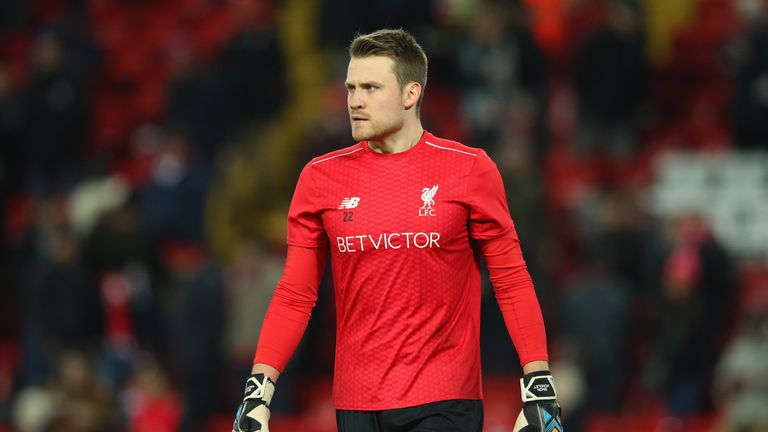 Simon Mignolet warms up ahead of Liverpool's clash with Stoke