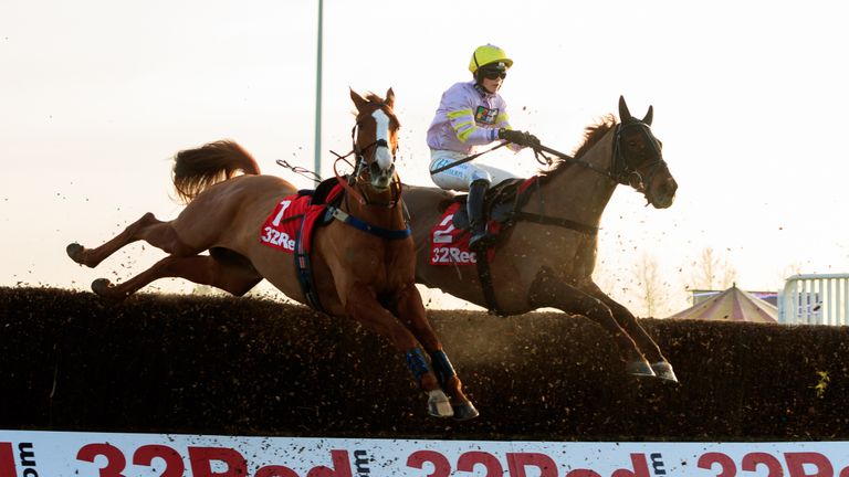 Sire De Grugy continues riderless after losing Jamie Moore at the second fence in the Desert Orchid Chase.