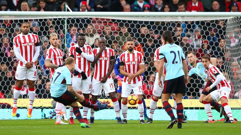 Scott Arfield attempts to score from a free-kick against Stoke for Burnley