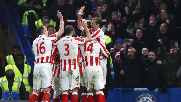 LONDON, ENGLAND - DECEMBER 31: Stoke City players celebrate their side's first goal during the Premier League match between Chelsea and Stoke City at Stamf