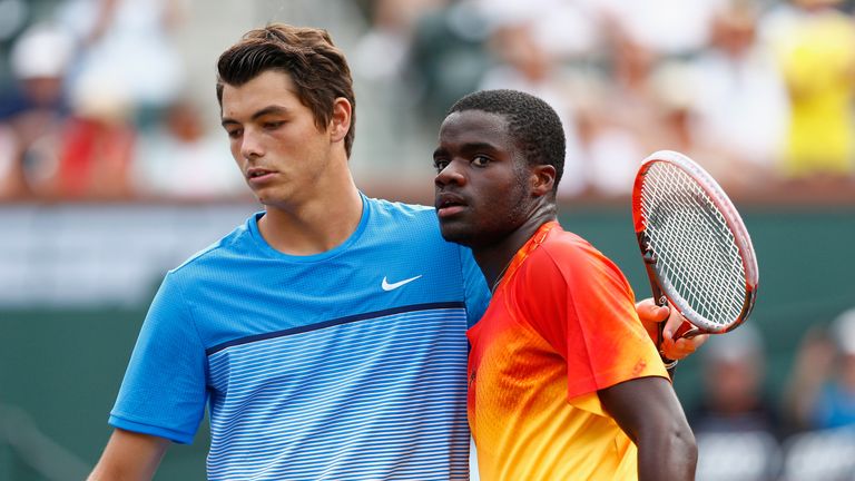 Frances Tiafoe is congratulated by Taylor Fritz