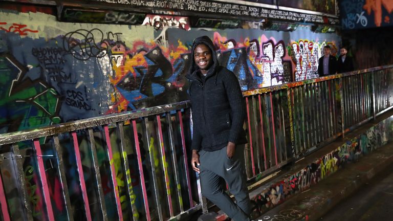 Tennis player Frances Tiafoe of USA poses for photos at Leake Street Tunnel