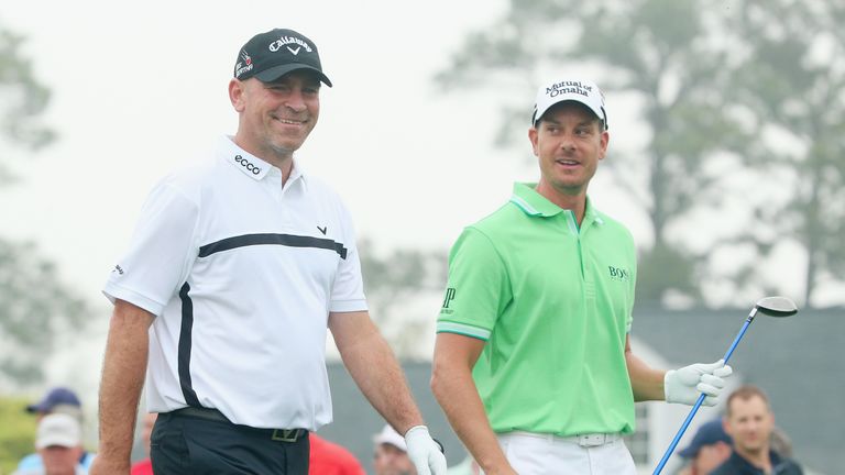 AUGUSTA, GA - APRIL 08:  Thomas Bjorn of Denmark and Henrik Stenson of Sweden walk together off a tee box during a practice round prior to the start of the