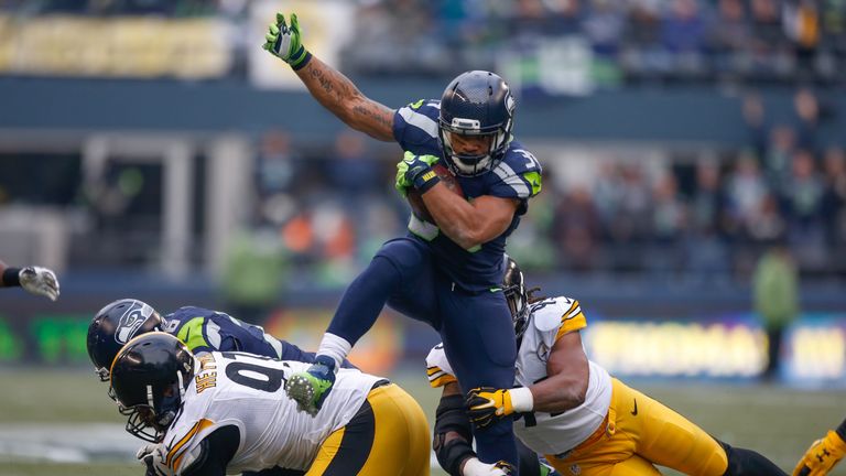 SEATTLE, WA - NOVEMBER 29:  Running back Thomas Rawls #34 of the Seattle Seahawks rushes against the Pittsburgh Steelers at CenturyLink Field on November 2