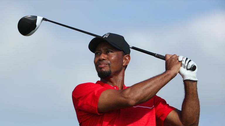 NASSAU, BAHAMAS - DECEMBER 04:  Tiger Woods of the United States hits his tee shot on the 13th hole during the final round of the Hero World Challenge at A