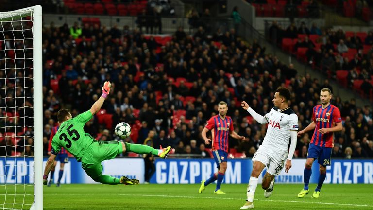 LONDON, ENGLAND - DECEMBER 07:  Dele Alli of Tottenham Hotspur (R) shoots which is later turnt into the CSKA Moscow goal by Igor Akinfeev of CSKA Moscow (L