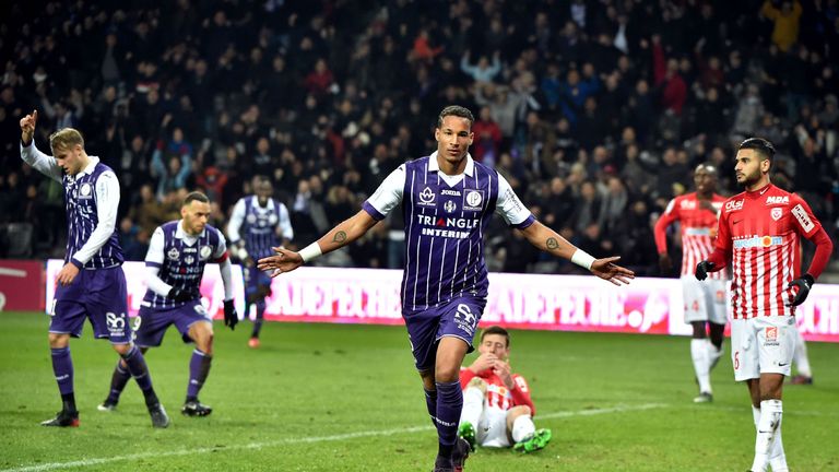 Toulouse's forward Christopher Jullien (C) celebrates after scoring against Nancy