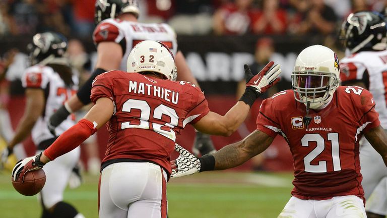 GLENDALE, AZ - OCTOBER 27:  Tyrann Mathieu #32 and teammate Patrick Peterson #21 of the Arizona Cardinals celebrate an interception against the Atlanta Fal