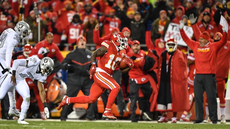 KANSAS CITY, MO - DECEMBER 8: Wide receiver Tyreek Hill #10 of the Kansas City Chiefs breaks beyond the Oakland Raiders last line of defense en route to a 