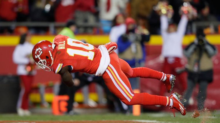 KANSAS CITY, MO - DECEMBER 8: Wide receiver Tyreek Hill #10 of the Kansas City Chiefs dives in to the end zone after a touchdown catch against the Oakland 
