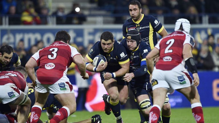 Clermont's French hooker Benjamin Kayser (C) looks to break through Ulster's defence