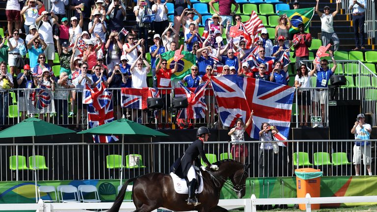 RIO DE JANEIRO, BRAZIL - AUGUST 15:  Gold medalist, Charlotte Dujardin of Great Britain riding Valegro celebrates during the medal ceremony during the Dres