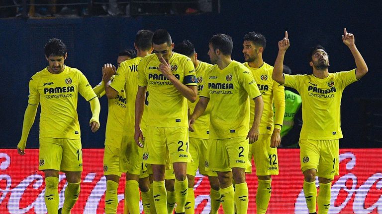 VILLARREAL, SPAIN - DECEMBER 12: Villarreal CF players celebrate after his team mate Manu Trigueros scored his team's first goal during the La Liga match b