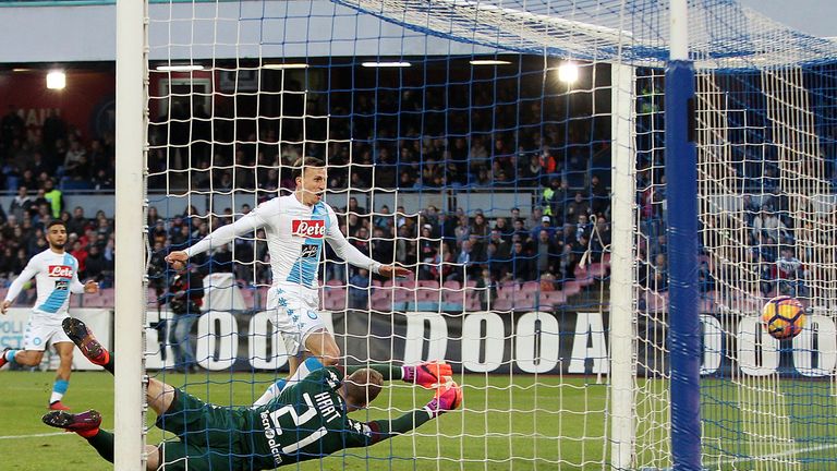 NAPLES, ITALY - DECEMBER 18: Napolis player Vlad Chiriches scores the 4-1 goal during the Serie A match between SSC Napoli and FC Torino at Stadio San Paol