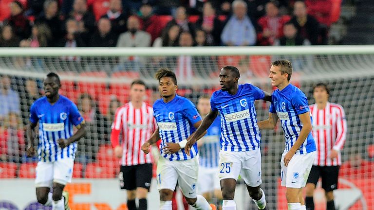 Genk's Nigerian midfielder Wilfred Ndidi (2ndR) is congratulated by teammates Jamaican midfielder Leon Bailey (C) and defender Timoty Castagne (R) after sc