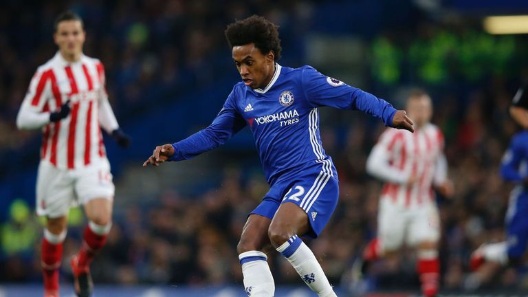Chelsea's Brazilian midfielder Willian controls the ball during the English Premier League football match between Chelsea and Stoke City at Stamford Bridge