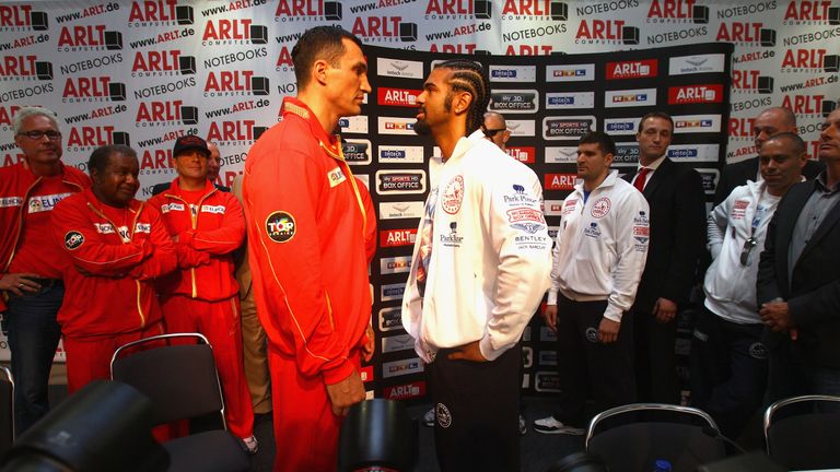 Wladimir Klitschko (L) of Ukraine pose on a head to head with David Haye of England