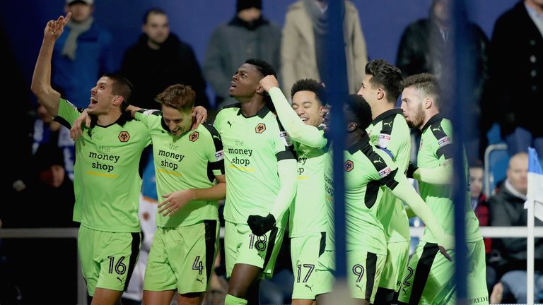 LONDON, ENGLAND - DECEMBER 01: DAVE EDWARDS OF WOLVES (2ndL) celebrates scoring his sides first goal with his Wolves team mates during the Sky Bet Champion