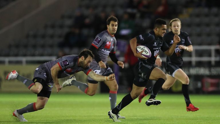 NEWCASTLE UPON TYNE, ENGLAND - DECEMBER 18: Zach Kibirige of Newcastle Falcons runs in to score a try during the European Rugby Challenge Cup match between