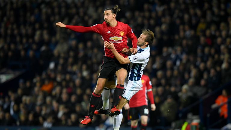 WEST BROMWICH, ENGLAND - DECEMBER 17:  Zlatan Ibrahimovic of Manchester United (L) and Craig Dawson of West Bromwich Albion (R) clash during the Premier Le