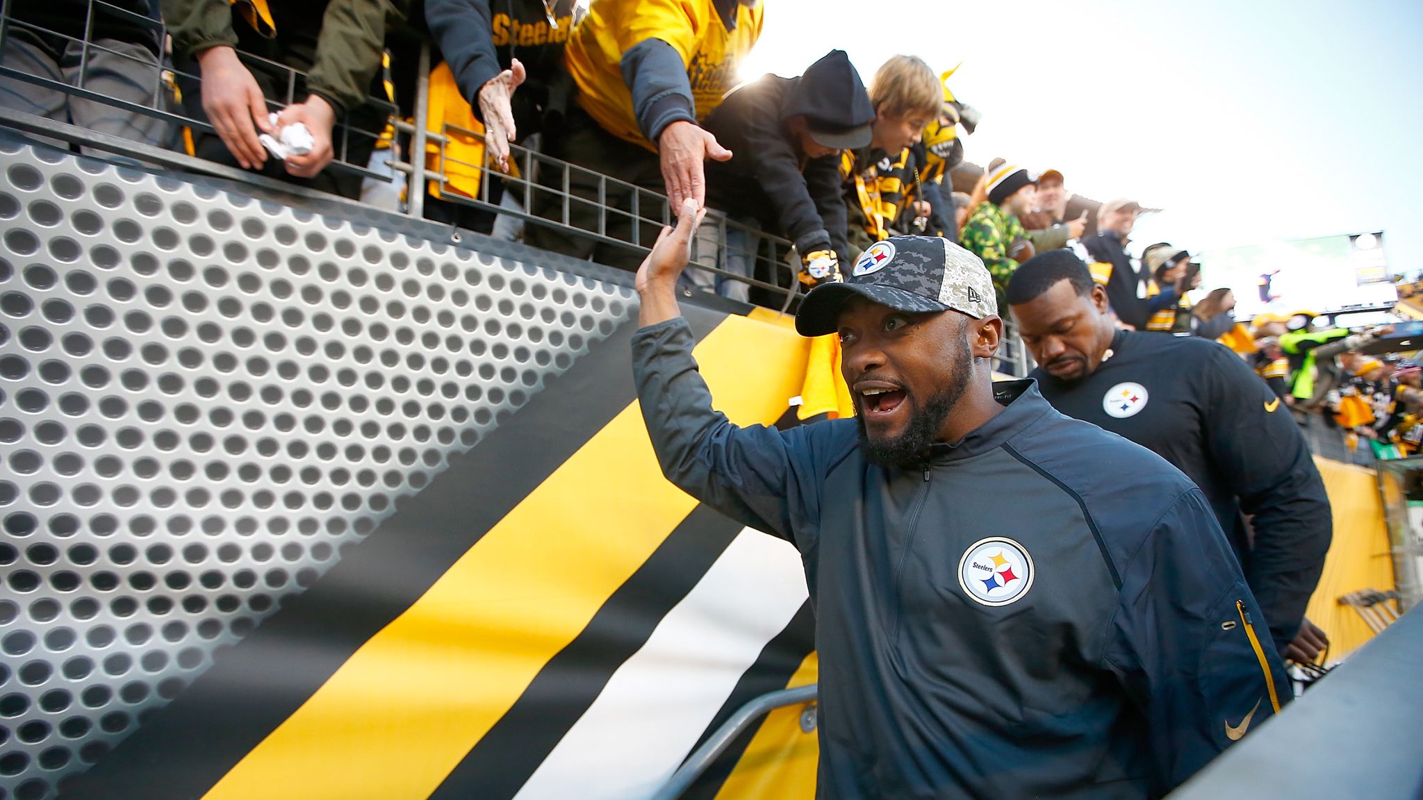 Pittsburgh Steelers head coach Bill Cowher watches the replay as