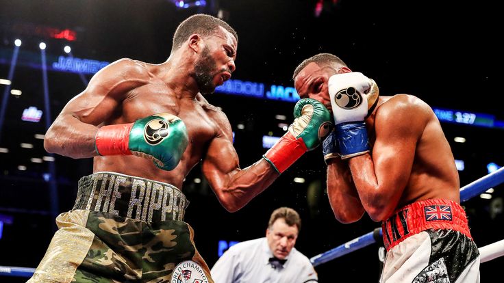 Badou Jack punches James DeGale during their WBC/IBF Super Middleweight Unification bout at the Barclays Center