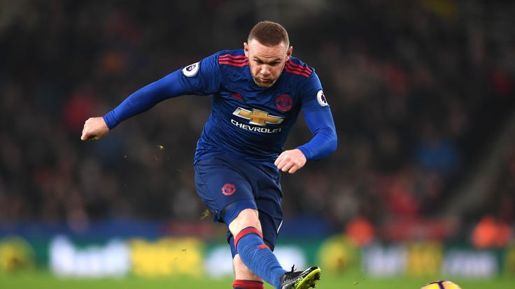 STOKE ON TRENT, ENGLAND - JANUARY 21: Wayne Rooney of Manchester United shoots during the Premier League match between Stoke City and Manchester United at 