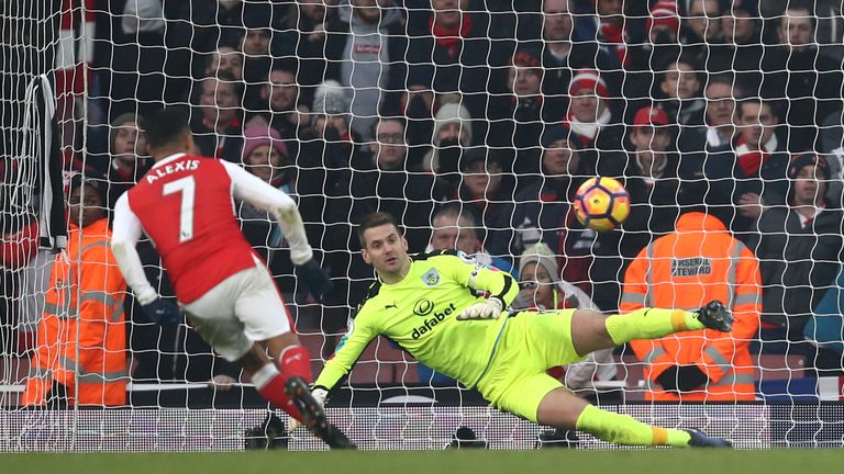 Alexis Sanchez of Arsenal converts the penalty to score his team's second goal during the Premier League match v Burnley