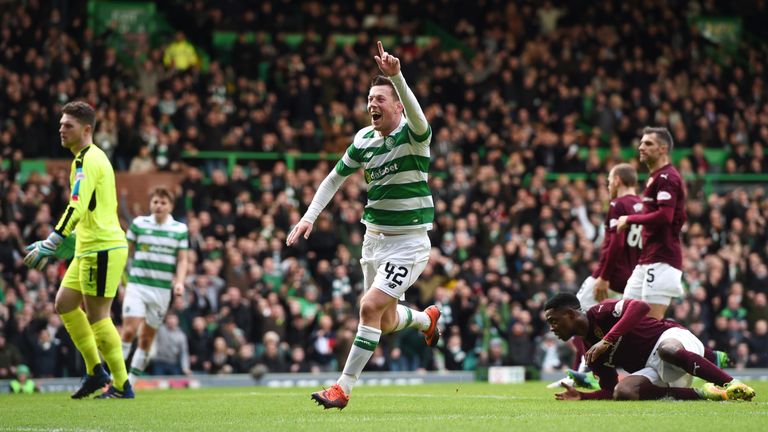 Callum McGregor wheels away in celebration after opening the scoring against Hearts