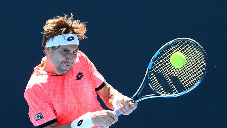 David Ferrer fought back to beat Ernesto Escobedo and take his place in the third round