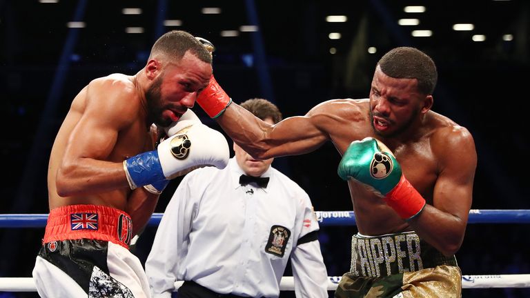 NEW YORK, NY - JANUARY 14:  Badou Jack punches James DeGale during their WBC/IBF Super Middleweight Unification bout at the Barclays Center on January 14, 