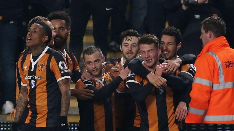 Josh Tymon (second right) celebrates his first senior goal, which sealed Hull's win over Swansea