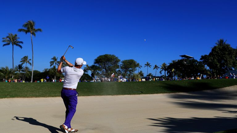 However, it wasn't all plain sailing for Thomas on Friday, seen here in a bunker on the 13th fairway