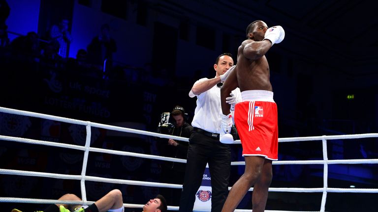 LONDON, ENGLAND - FEBRUARY 18:  Lawrence Okolie of the British Lionhearts (red shorts) celebrates after knocking down Jared Barraza of the Mexico Guerreros