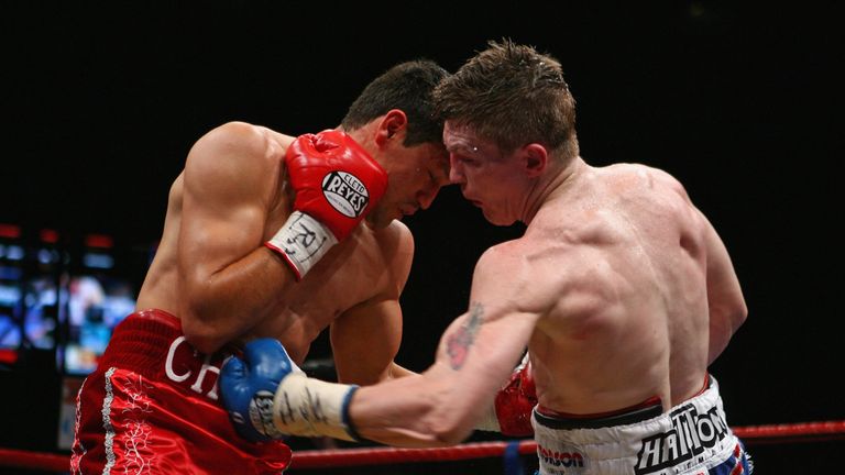 MANCHESTER, UNITED KINGDOM - MAY 24:  Ricky Hatton hits Juan Lazcano with a left hand body punch during the IBO light-welterweight title fight between Rick
