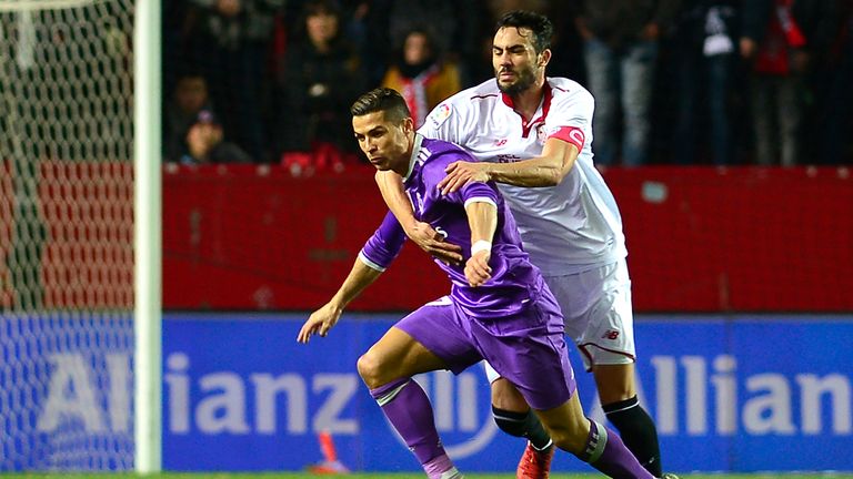 Sevilla's midfielder Iborra (R) vies with Real Madrid's  Cristiano Ronaldo