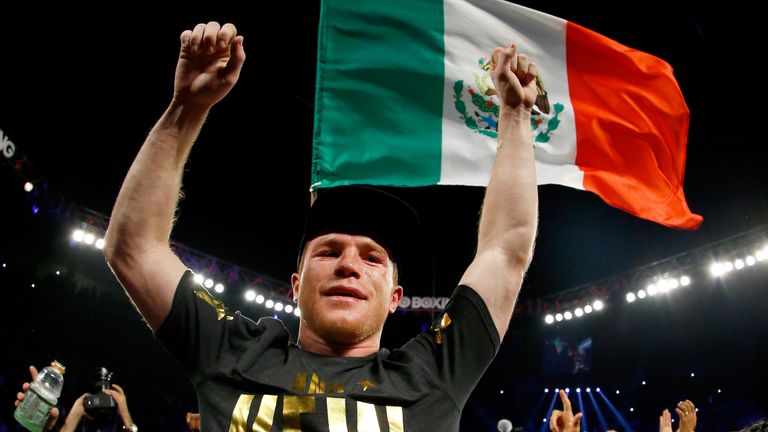 LAS VEGAS, NV - NOVEMBER 21:  Canelo Alvarez celebrates after defeating Miguel Cotto by unanimous decision in their middleweight fight at the Mandalay Bay 